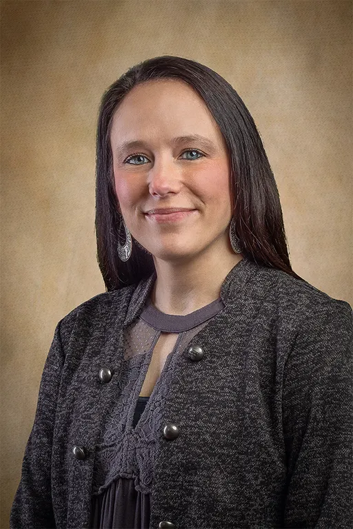 headshot of Carrie Noel, the office administrator of Compass Insurance Group